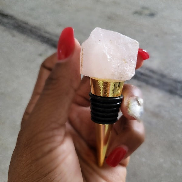 a close up of a person holding a drink