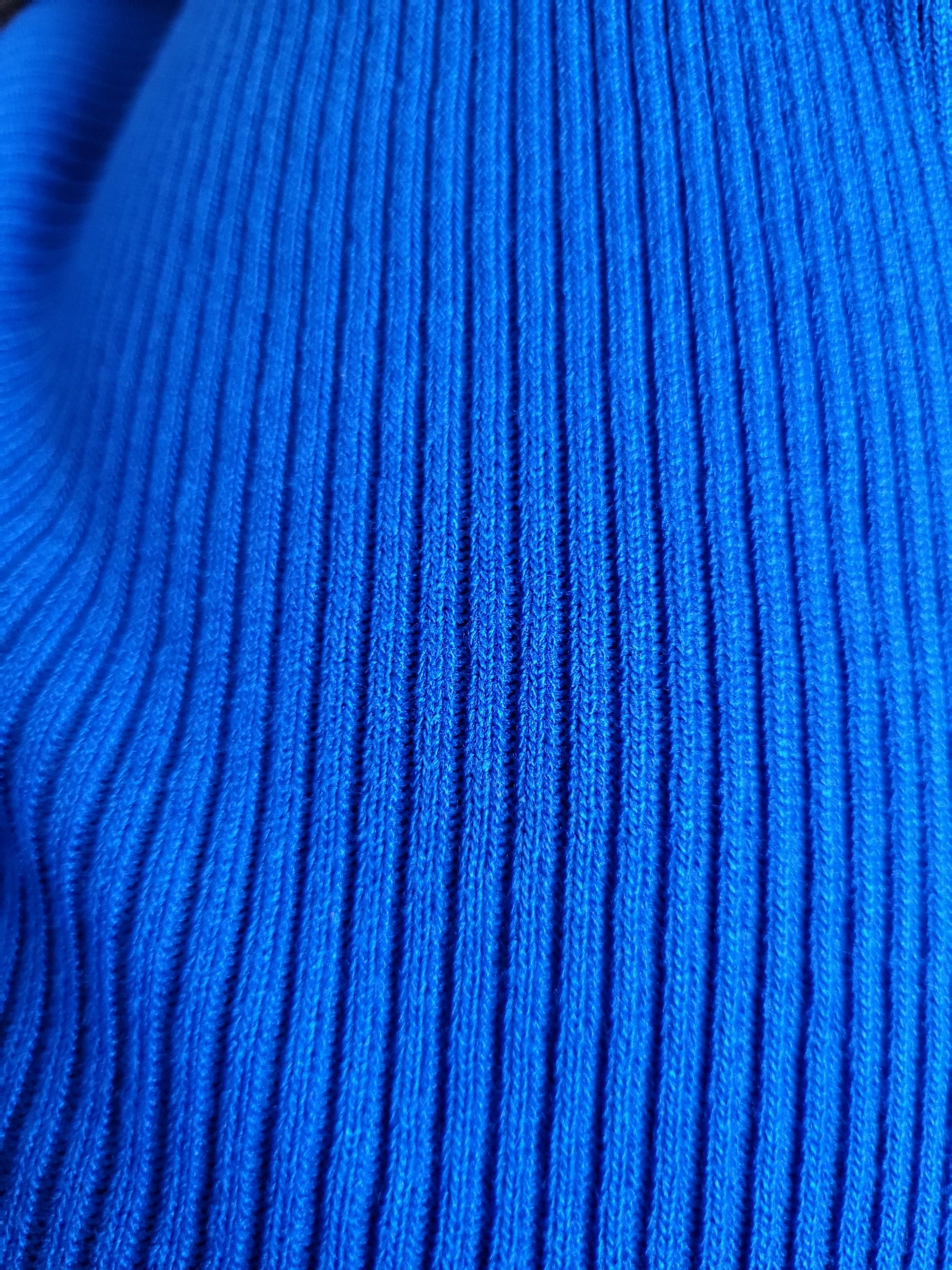a close up of a blue and white shirt 