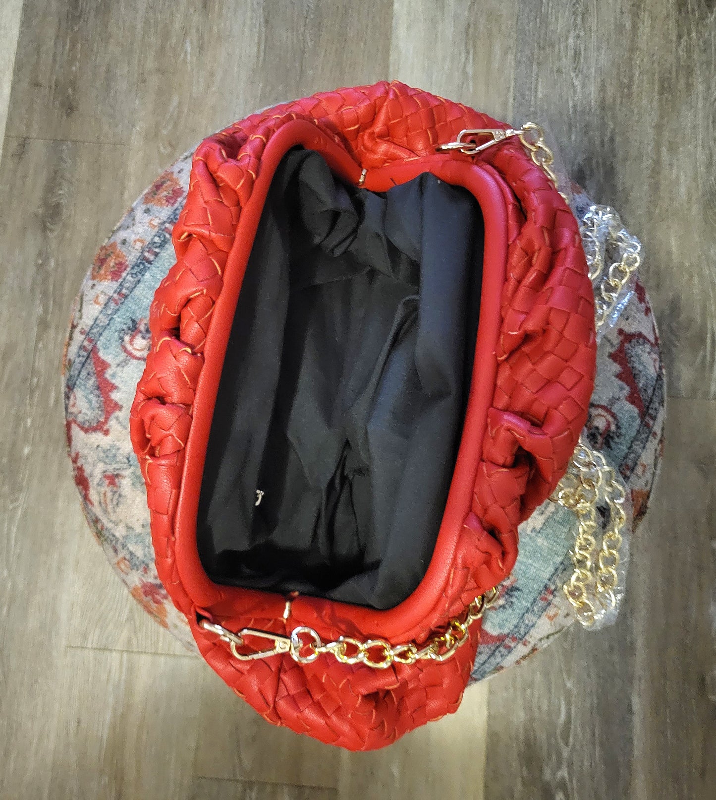 a suitcase with a red cover on it