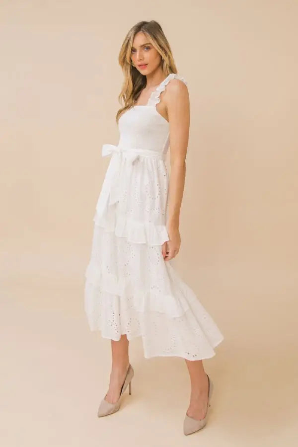 a woman in a white dress in a white dress