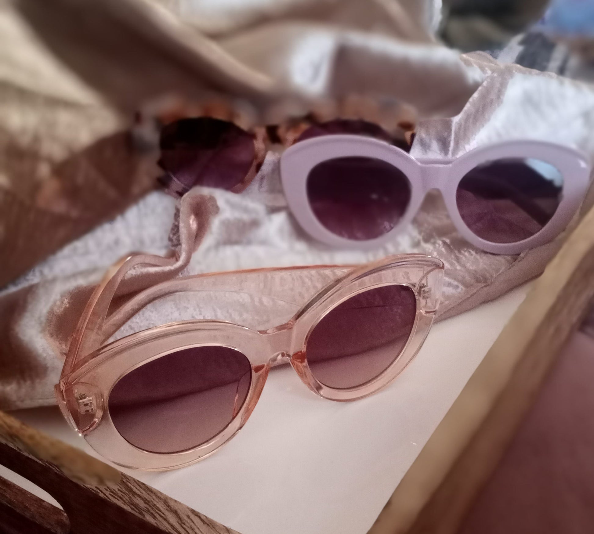 a pair of sunglasses and a pair of sunglasses 