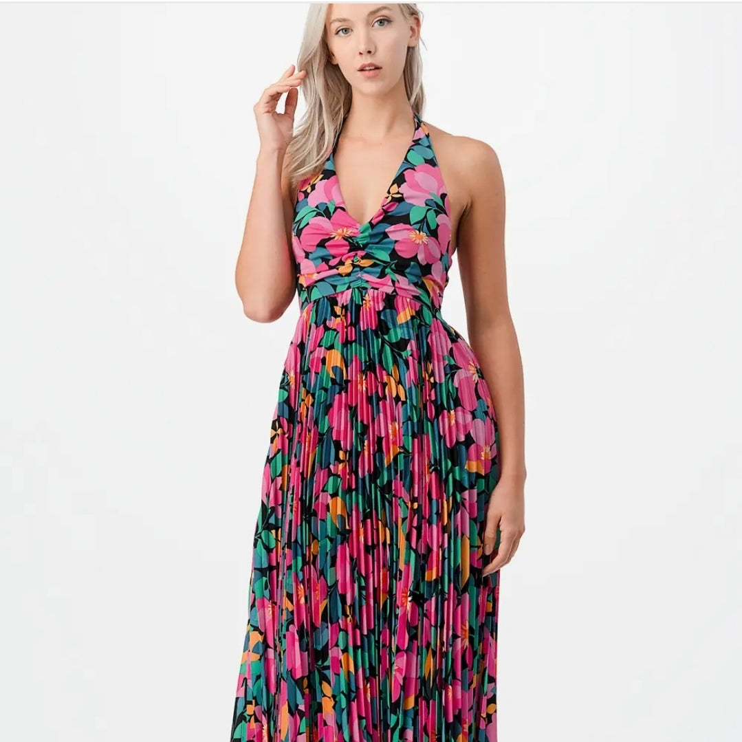 a woman in a dress holding a cell phone