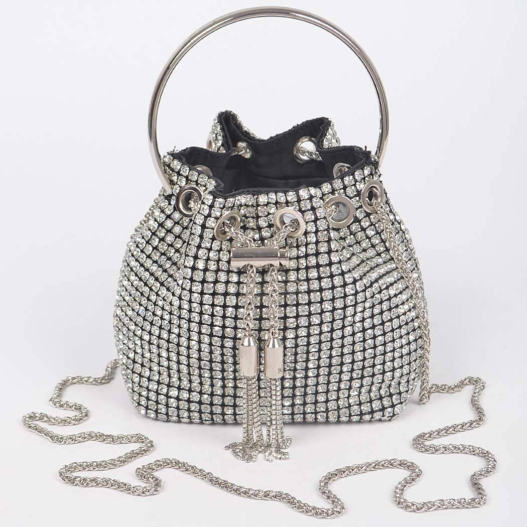 a owl is sitting on top of a purse