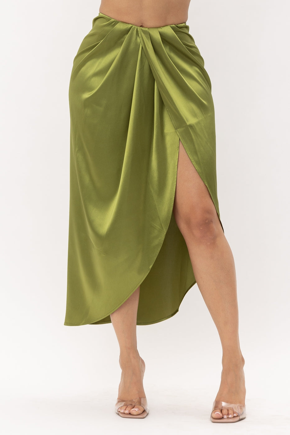 a close up of a person wearing a green shirt